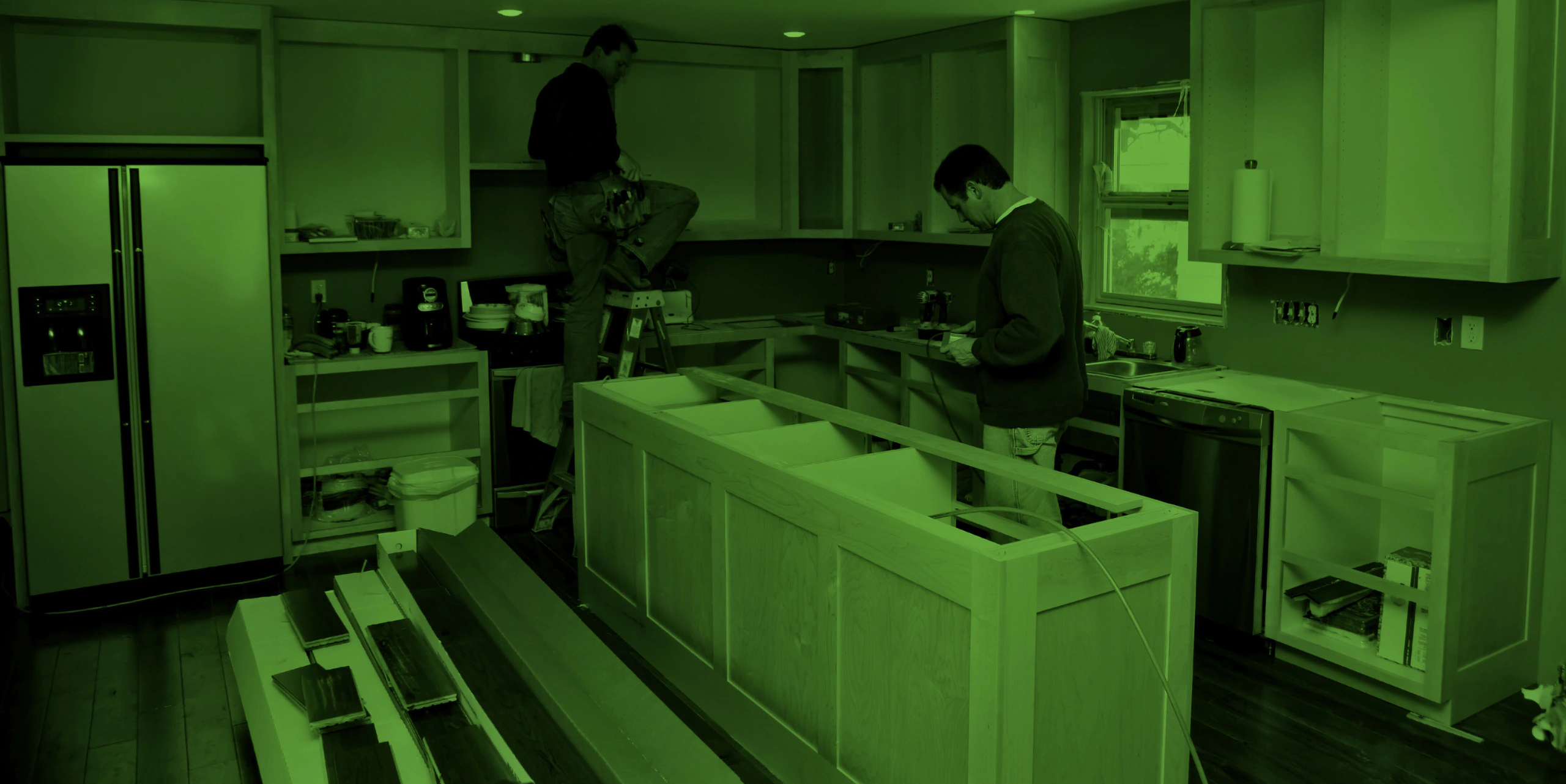 two workers redesigning the kitchen